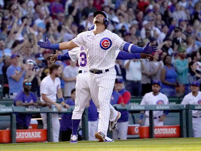 Chicago Cubs’ Willson Contreras celebrates his grand slam off Pittsburgh Pirates relief pitcher Bryse Wilson during the first inning of a baseball game Monday, May 16, 2022, in Chicago.